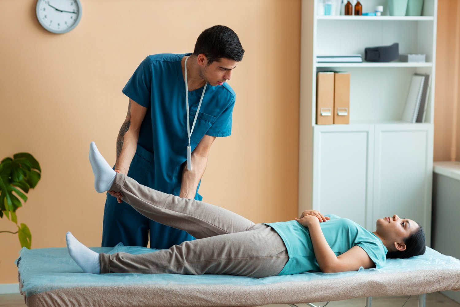 doctor-helping-patient-during-rehabilitation